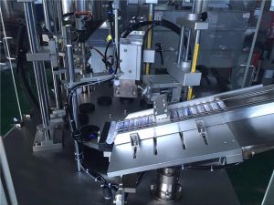 Ultraääniä sulkeva kosmeettisten putkien täyttölaite