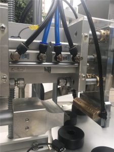 Ultraääniä sulkeva kosmeettisten putkien täyttölaite